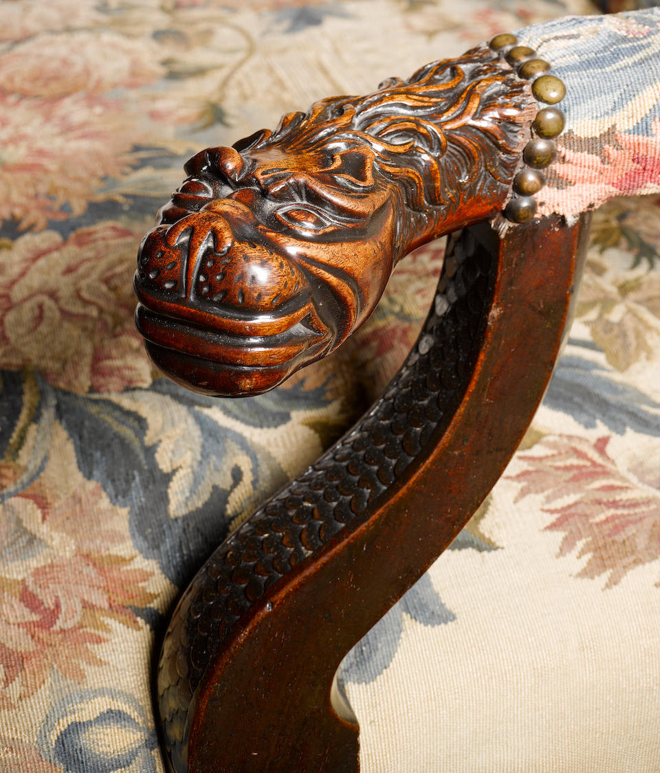 A fine George II carved mahogany Library Open Armchairin the manner of Giles Grendey