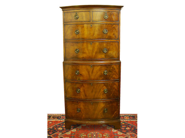 A mahogany bow-front chest on chest Elements 19th Century