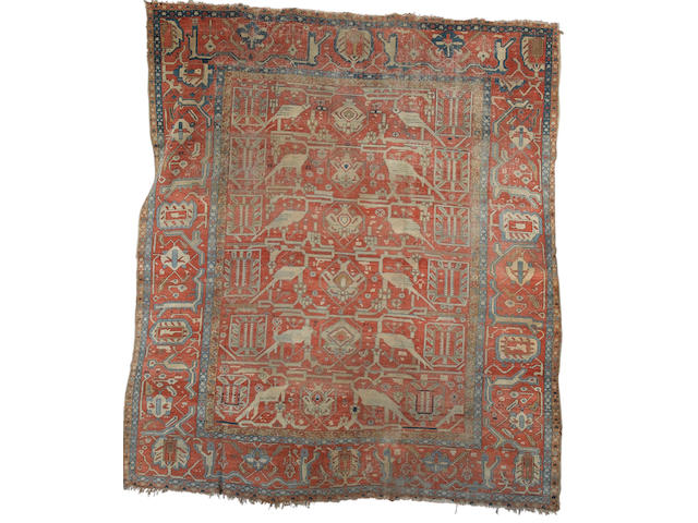 A Heriz carpet North West Persia, 13 ft 7 in x 12 ft (414 x 366 cm) some wear