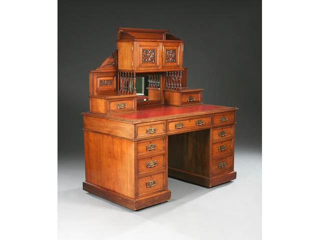 A mid-Victorian walnut pedestal desk