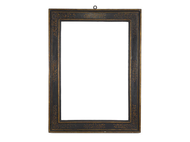 An Italian 16th Century ebonised and parcel gilt cassetta frame