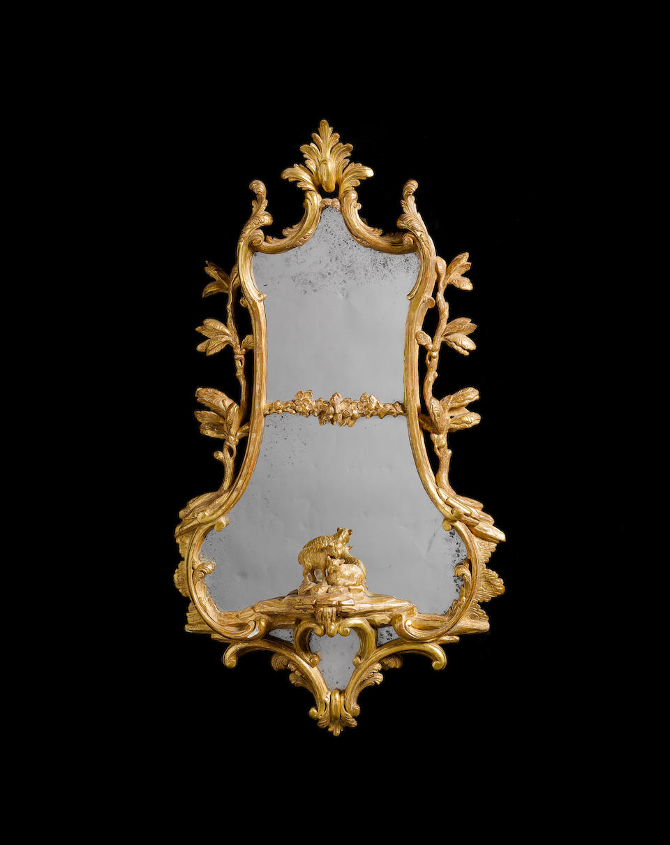 A pair of carved giltwood Mirrors