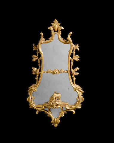 A pair of carved giltwood Mirrors