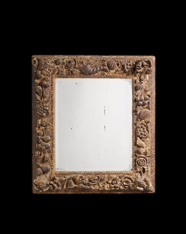 A late 17th century carved pine Mirror