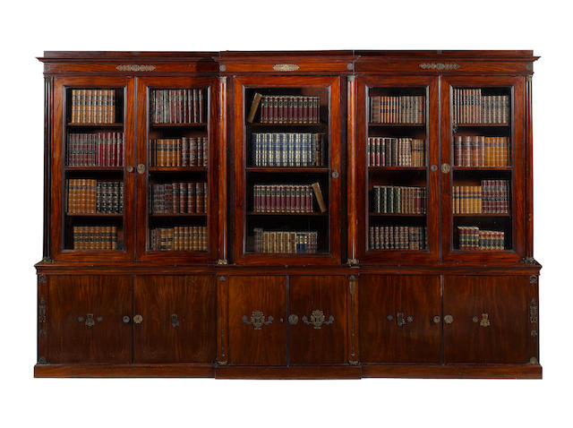 An Empire mahogany and gilt bronze mounted breakfront Library Bookcase in the manner of Jacob-Desmalter