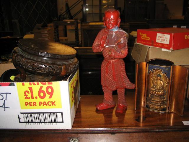 A Chinese cinnabar lacquer figure of a man