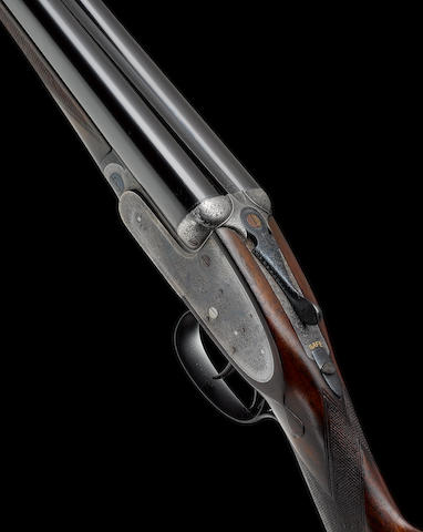 A fine 12-bore self-opening sidelock ejector gun by J. Purdey, no. 26047 The whole in its brass-mounted oak and leather case