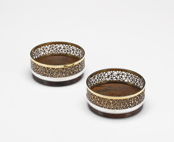 STUART DEVLIN: A pair of silver and silver-gilt coasters, London 1971,