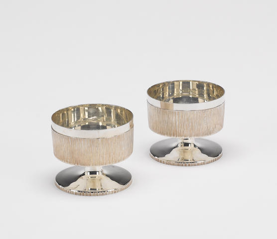 MICHAEL WINTER : A pair of silver candle light holders, London 2003,