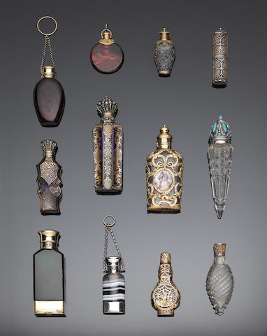 An early 19th century French lithyalin glass and silver-gilt scent bottle, maker's lozenge mistruck, and three silver mounted lithyalin glass bottles,