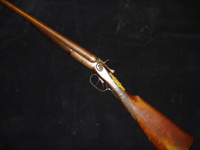 A 12-bore hammer gun by W.J. Hill
