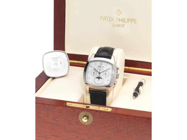Patek Philippe. A fine and rare 18ct white gold perpetual calendar chronograph wristwatch with moonphase, together with a fitted box, setting pin and spare solid case back with Extract from ArchivesRef:5020, Case No.2956045, Movement No.3045093, Made in 1994, Sold December 20th 1994