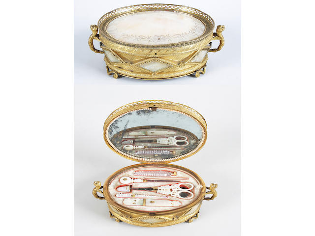 A good mid-19th century gilt metal and mother-of-pearl Palais Royal sewing casket, with a complete complement of tools