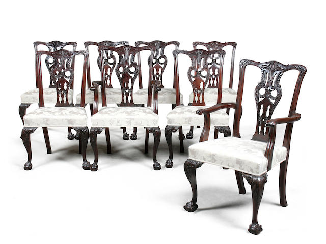 A set of eight early 20th century George III style mahogany dining chairs