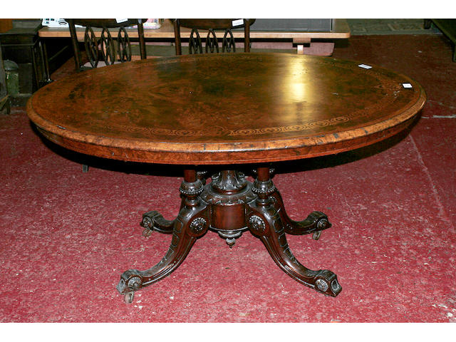 A late 19th century walnut loo table