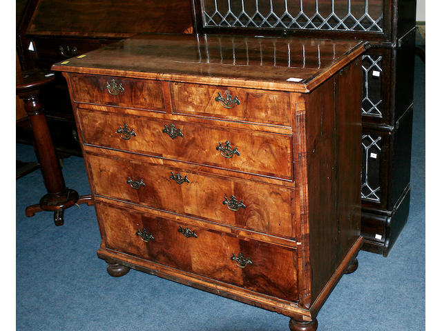 A George I walnut and pine chest of drawers