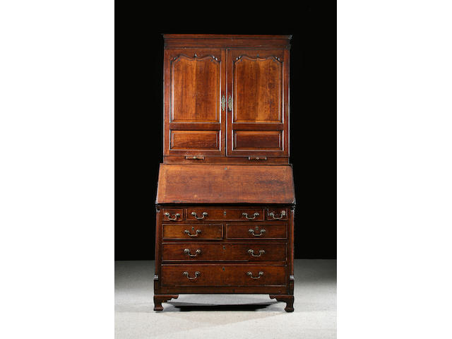 An oak bureau cabinet, late 18th Century