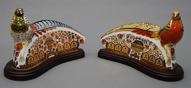 A pair of Royal Crown Derby Imari pheasant figures on stands