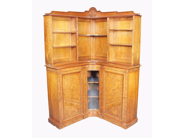 An unusual Victorian burr walnut, tulipwood crossbanded and line inlaid corner bookcase