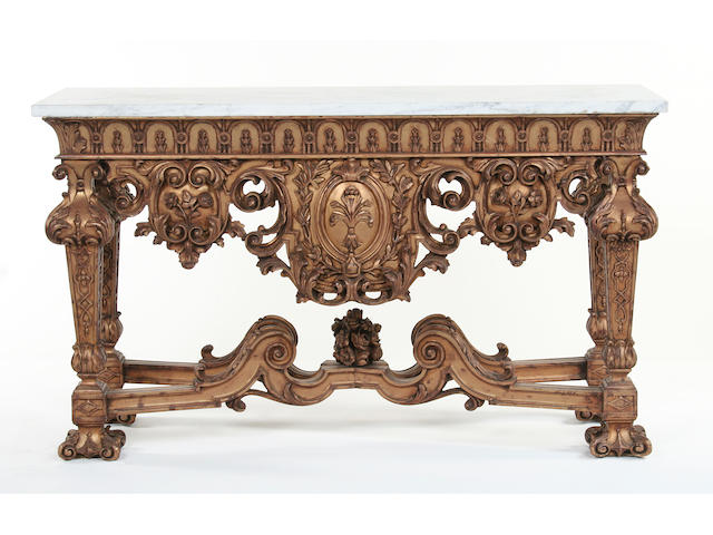 An English Baroque style carved giltwood side table