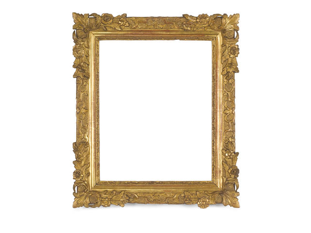 A Provincial 18th Century carved and gilded frame