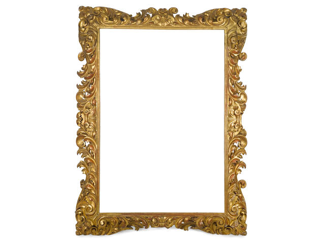 A Florentine 19th Century carved, pierced and gilded frame