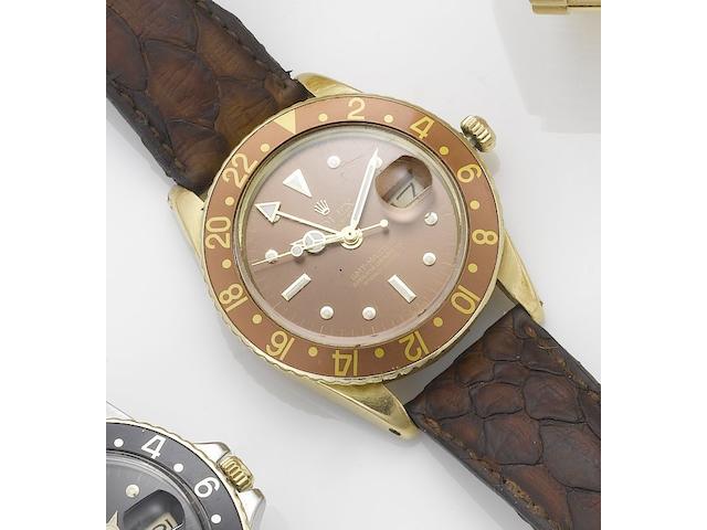Rolex. An 18ct gold automatic centre seconds calendar twin time zone wristwatchGMT Master, Ref:1675, 1970's