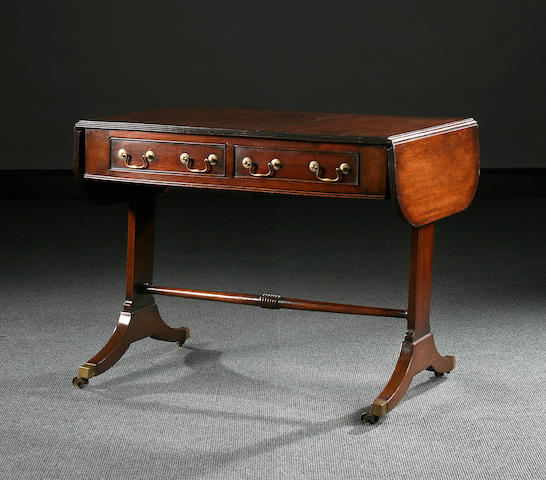 A mahogany sofa table, early 19th Century
