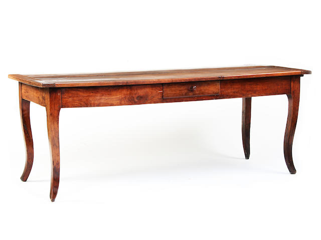 A 19th century French cherrywood and oak farmhouse table