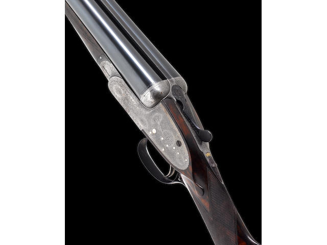A fine 12-bore single-trigger sidelock ejector gun by Boss & Co., no. 5516 In its brass-mounted oak and leather case
