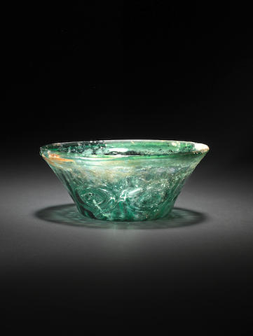 A moulded glass Bowl Persia, 10th/ 11th Century
