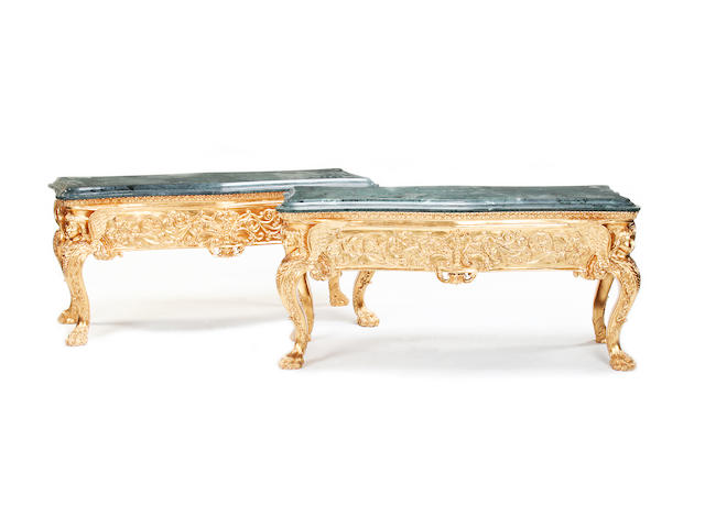 A pair of mid 18th century style carved giltwood low tables