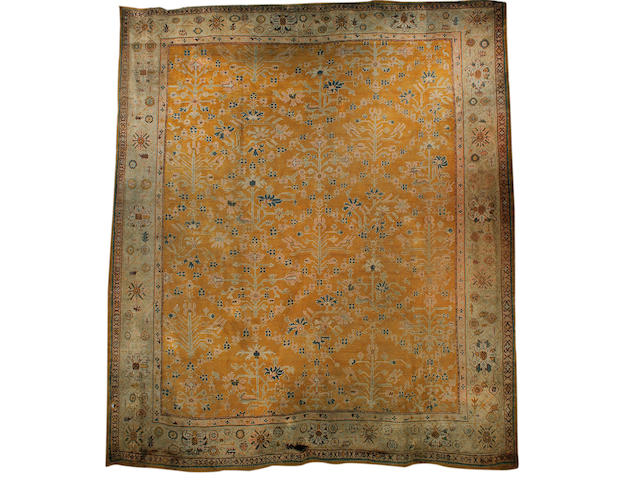 An Ushak carpet West Anatolia, 15 ft 6 in x 13 ft 5 in (471 x 407 cm)some damages