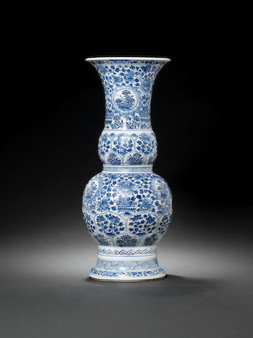 A blue and white double-gourd beaker vase Kangxi