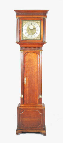 A George III oak and mahogany crossbanded longcase clock