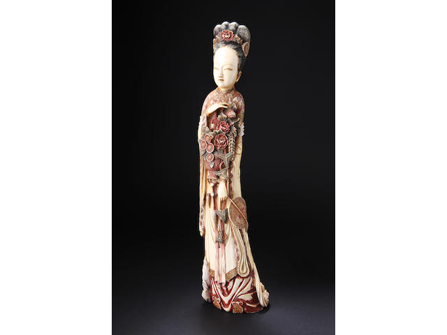 A large stained ivory figure of a court lady Circa 1900,