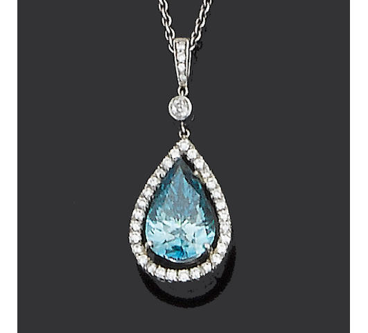 A treated blue diamond and diamond pendant
