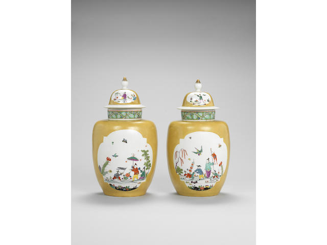 A pair of Meissen yellow-ground vases and covers
