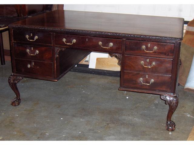 A reproduction Chippendale style mahogany partners desk,