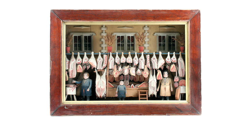 A fine 19th Century carved wooden diorama of a butcher's shop