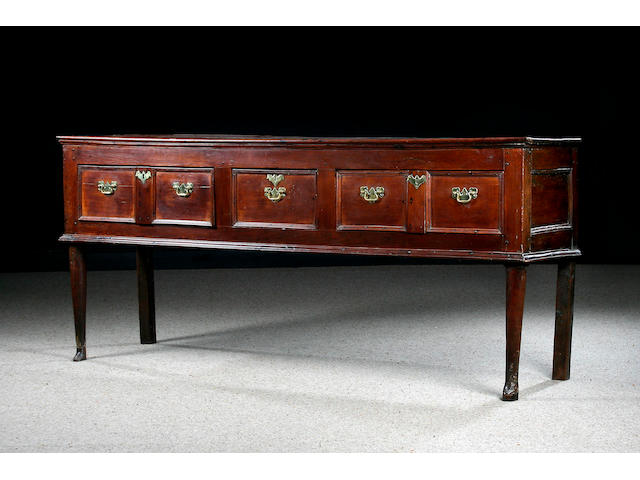An 18th century fruitwood low dresser