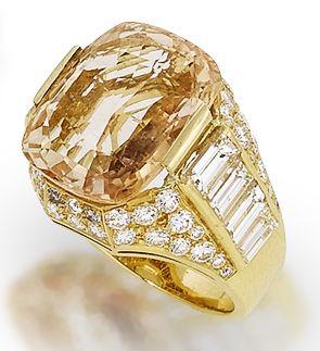Bonhams : An orange sapphire and diamond dress ring, by Bulgari
