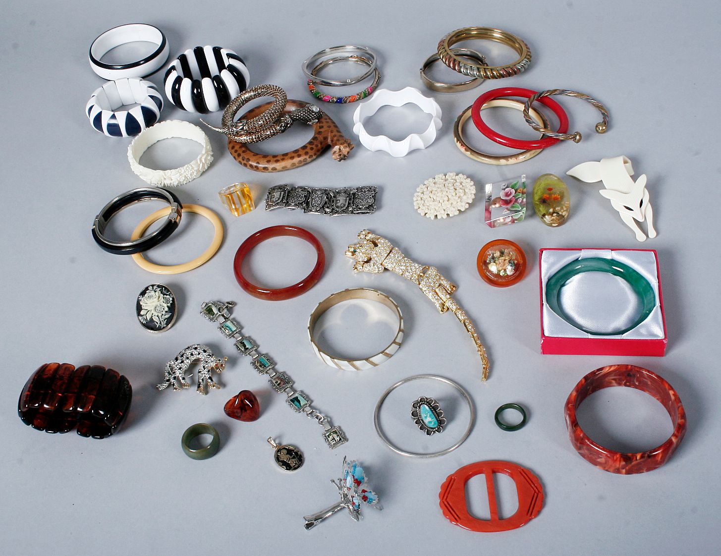 Numerous bangles and bracelets