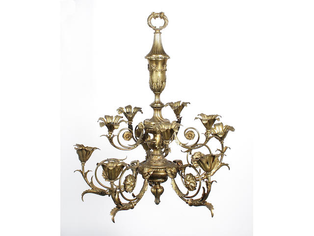A brass ten branch electrolier of classical design, early 20th century