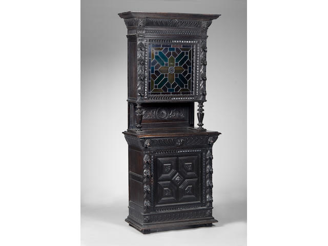 A late 19th century German carved oak bookcase cabinet
