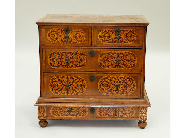 A late 17th century and later walnut and arabesque marquetry chest on stand