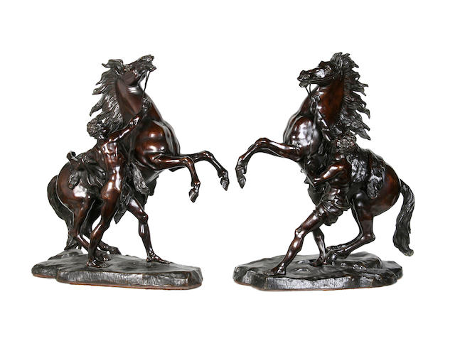 After Guillaume Coustou The Elder (French 1677-1746): A large pair of late 19th century bronze models of the Marly Horses