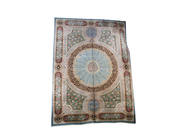 A Romanian carpet of European design 539cm x 397cm