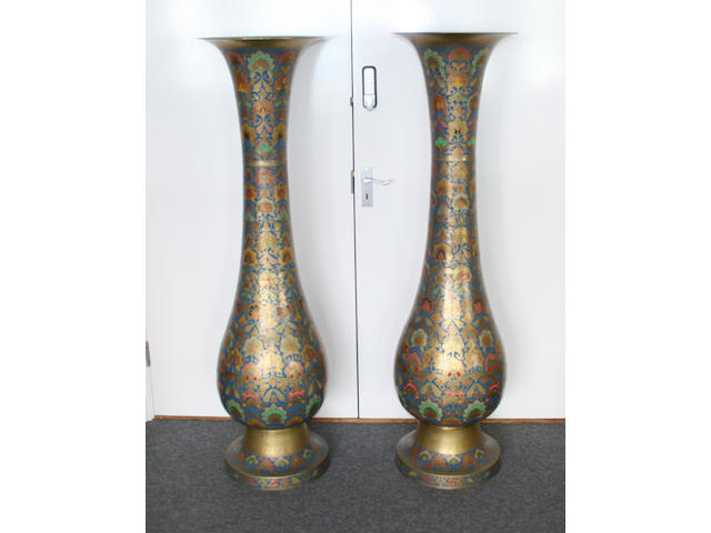 A pair of very large brass and enamel polychrome decorated vases