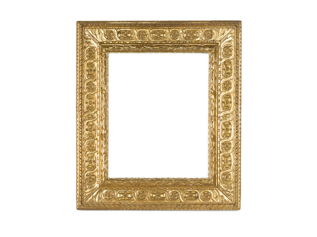 An Italian 16th Century carved and gilded cassetta frame